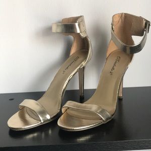 Gold strappy heels